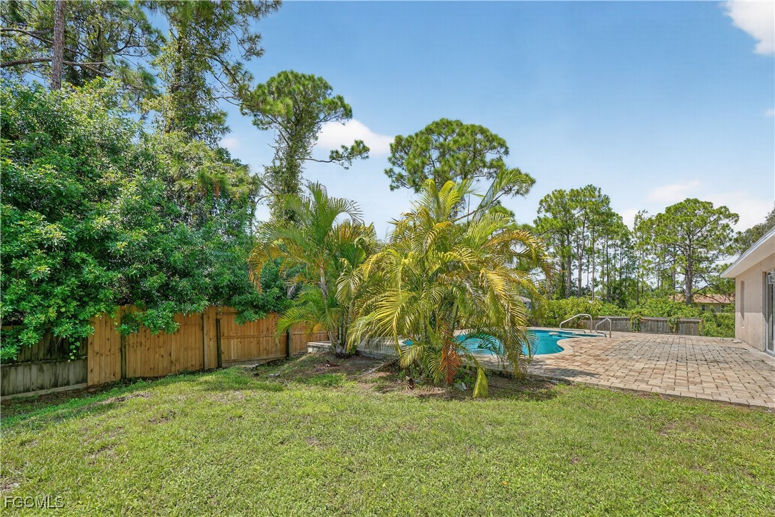 8811 Buckingham Road Fort Myers, FL 33905 - Photo 5 of 30 a view of a yard with a tree