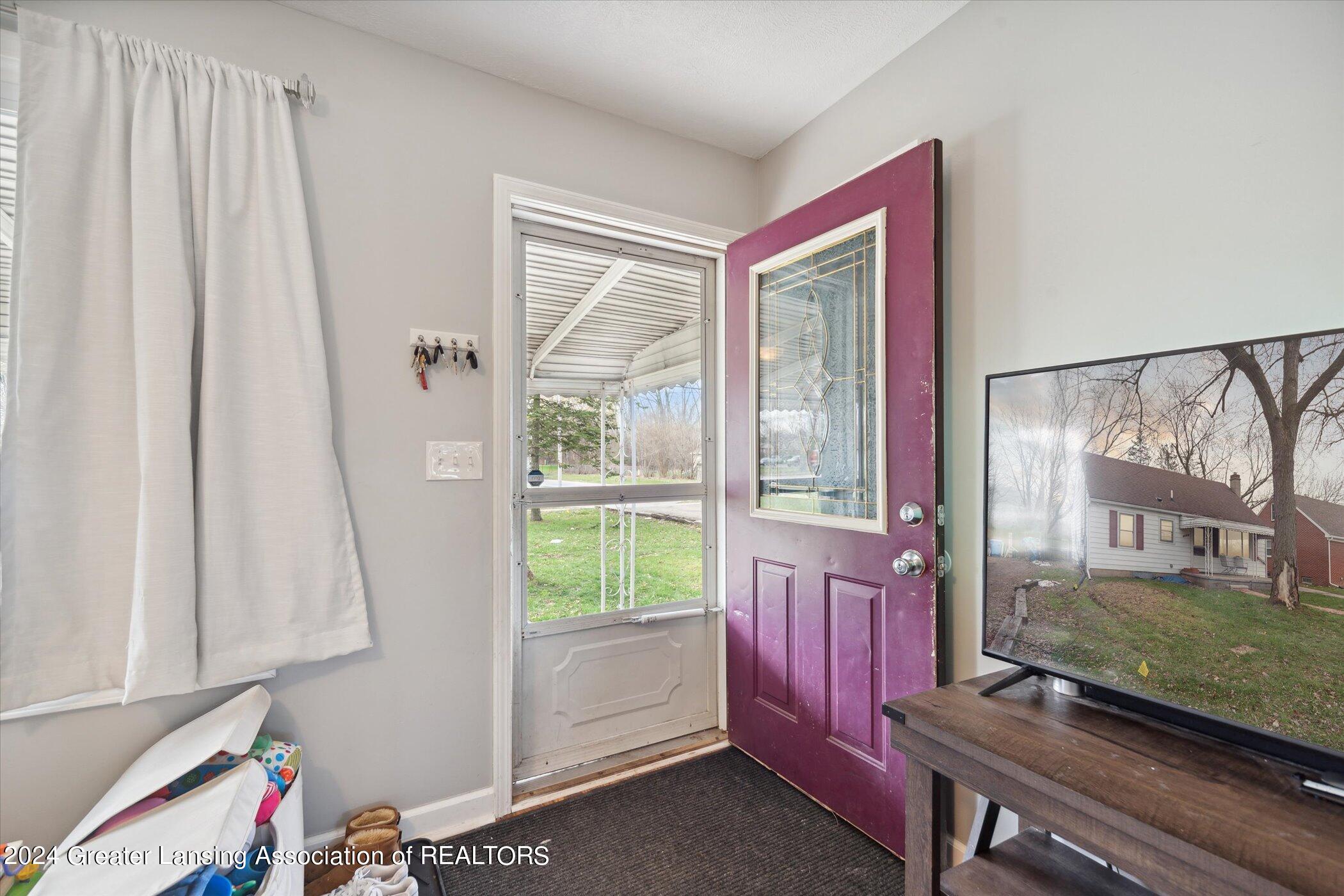 3611 Pleasant Grove Road Lansing, MI 48910 - Photo 4 of 26 06-3611-Pleasant-Grove-Rd-Lansing-MI-489