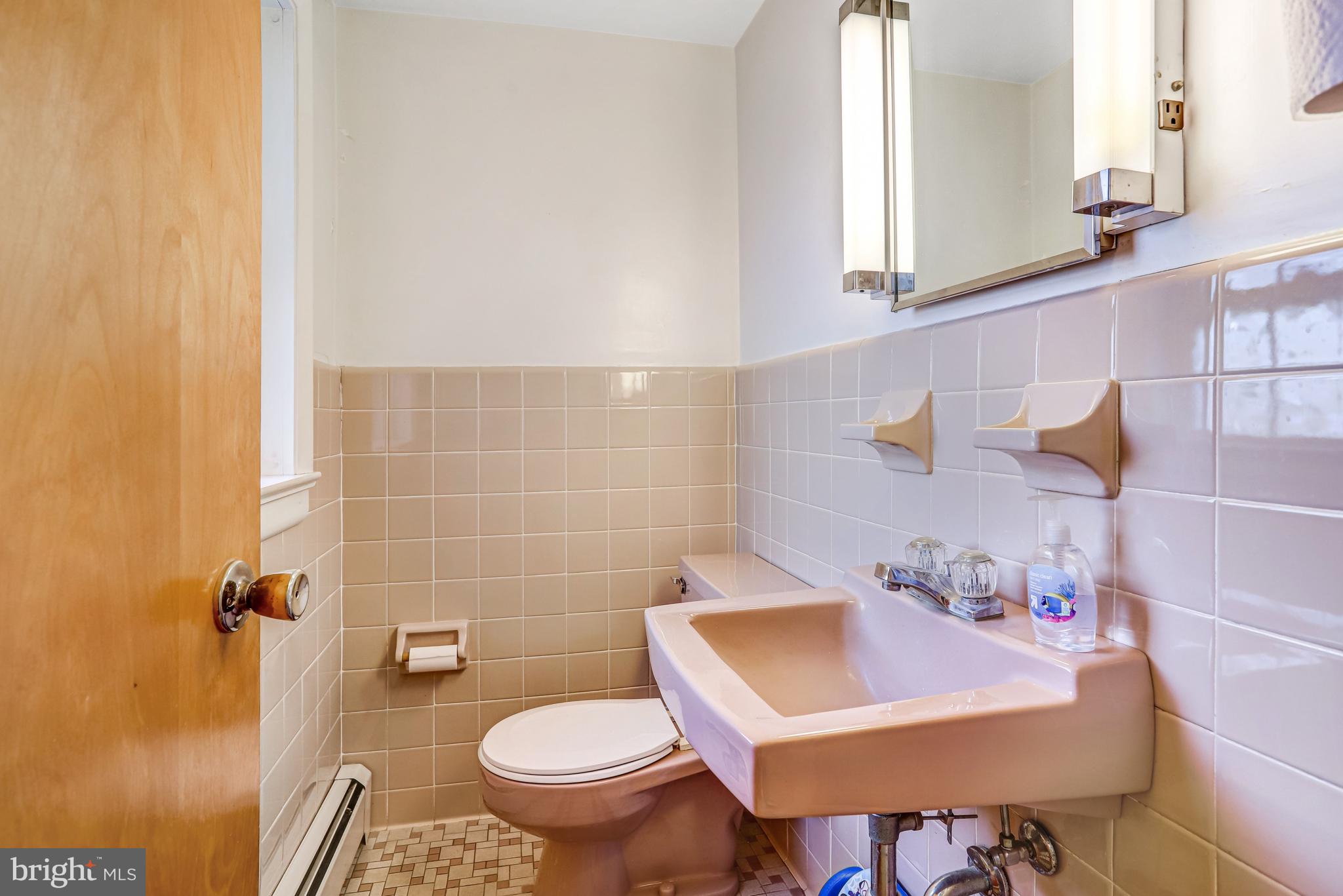 7951 Yellow Springs Road Frederick, MD 21702 - Photo 12 of 22 a bathroom with a sink toilet and a mirror