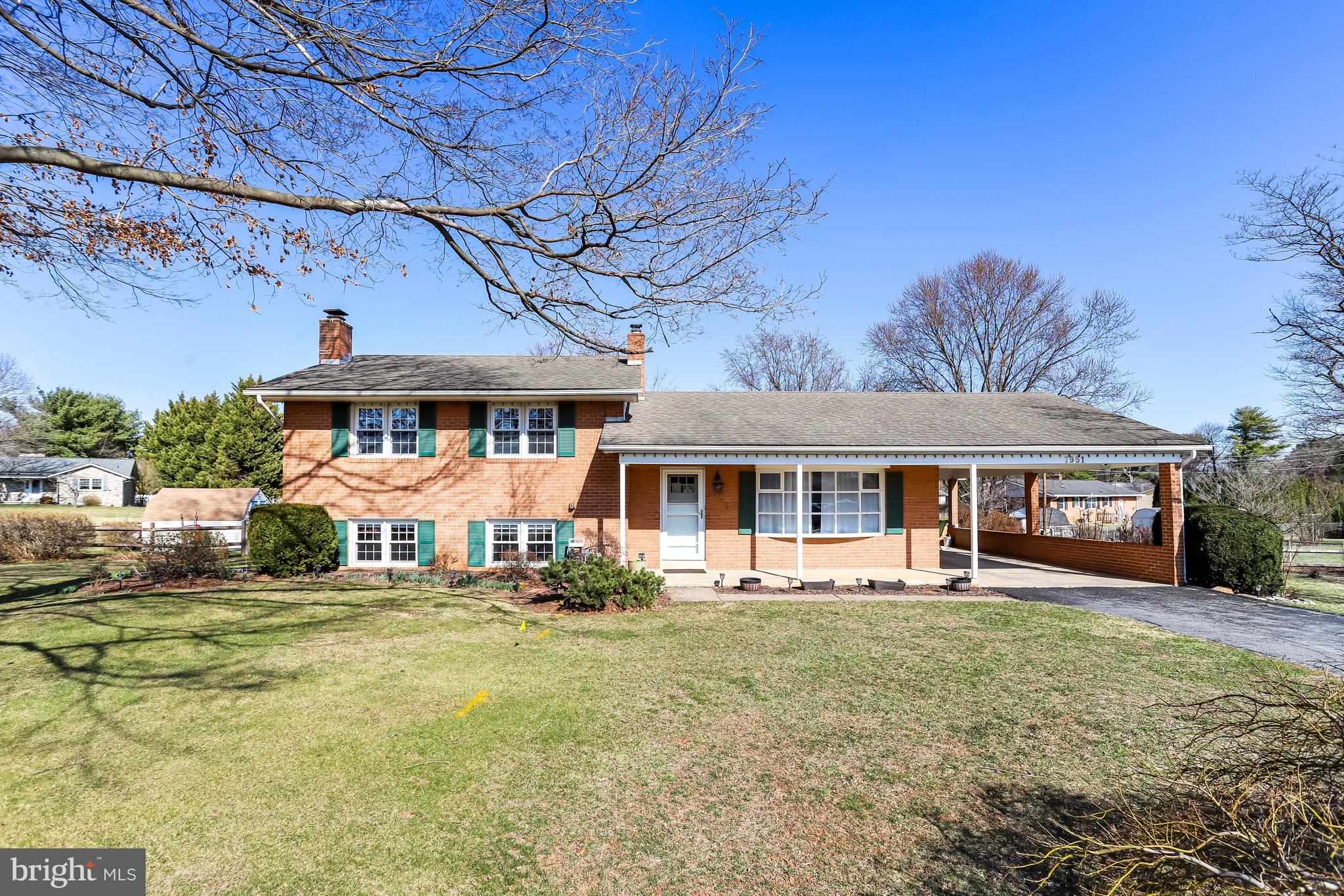 7951 Yellow Springs Road Frederick, MD 21702 - Photo 19 of 22 a front view of a house with a yard
