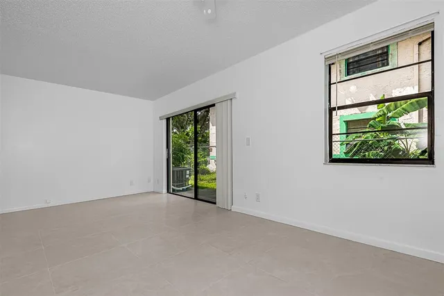 a bathroom with a toilet a sink and shower