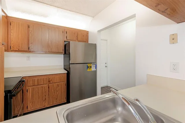 an aerial view of a house with yard swimming pool and outdoor seating