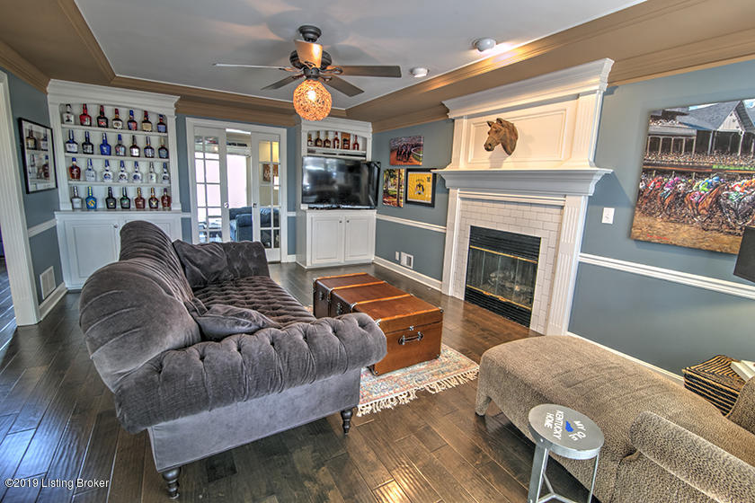 5720 Moser Farm Road Prospect, KY 40059 - Photo 8 of 64 Beautiful built-ins and fireplace with subway-tiled surround.