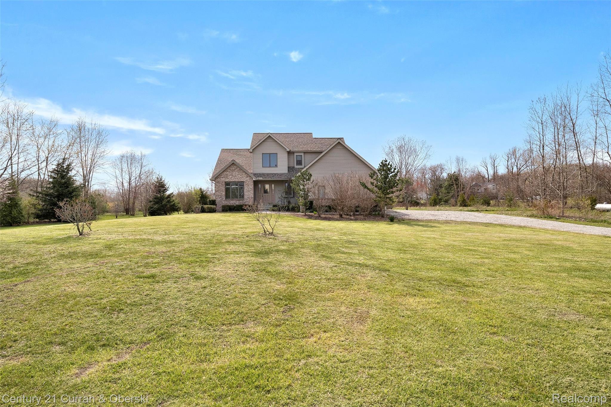 12701 Capernall Road Carleton, MI 48117 - Photo 15 of 45 Front yard and house