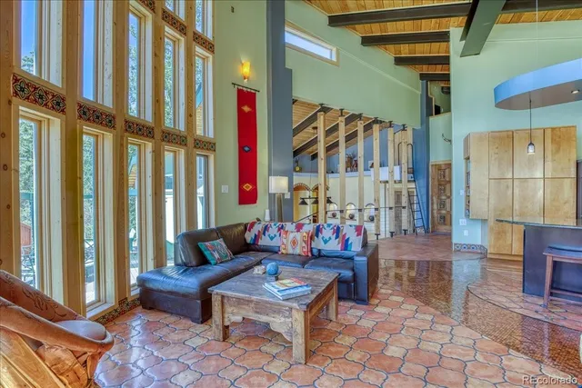 a kitchen with sink a stove and cabinets