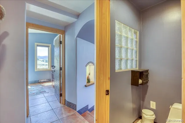 a bathroom with a sink a vanity and a mirror