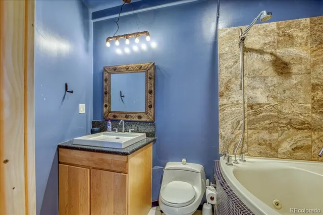 a view of a living room and dining room