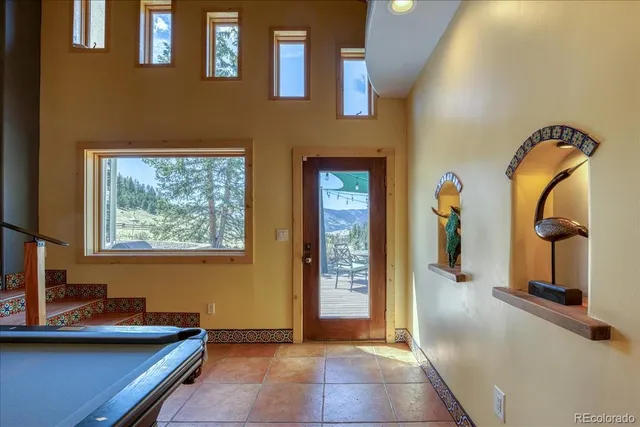 a view of a swimming pool with a yard