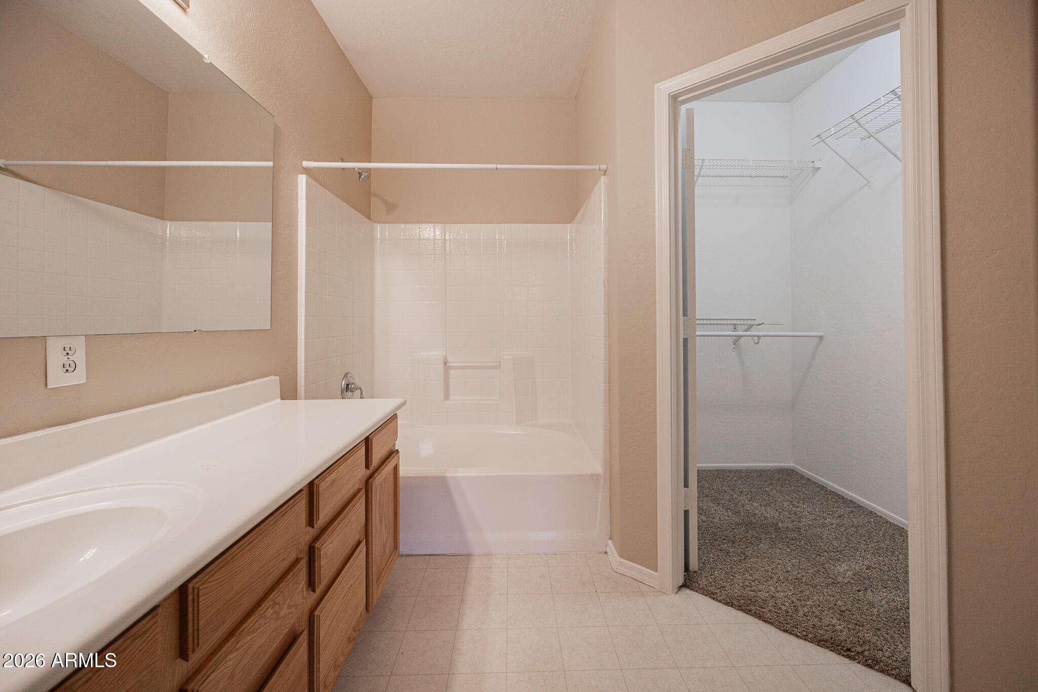 6426 South Nash Way Chandler, AZ 85249 - Photo 14 of 23 a bathroom with a sink and a shower