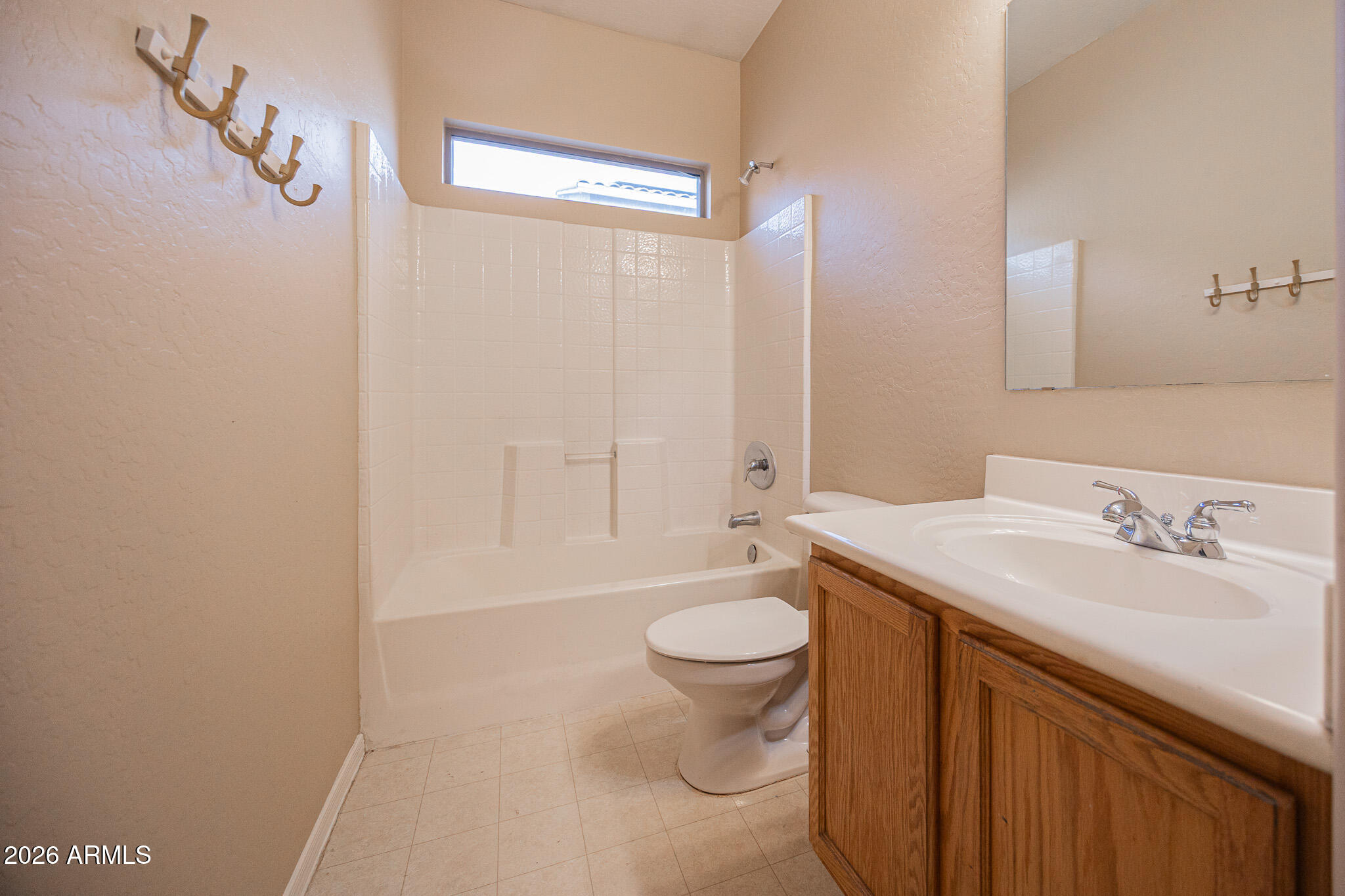 6426 South Nash Way Chandler, AZ 85249 - Photo 16 of 23 a bathroom with a sink a toilet and shower