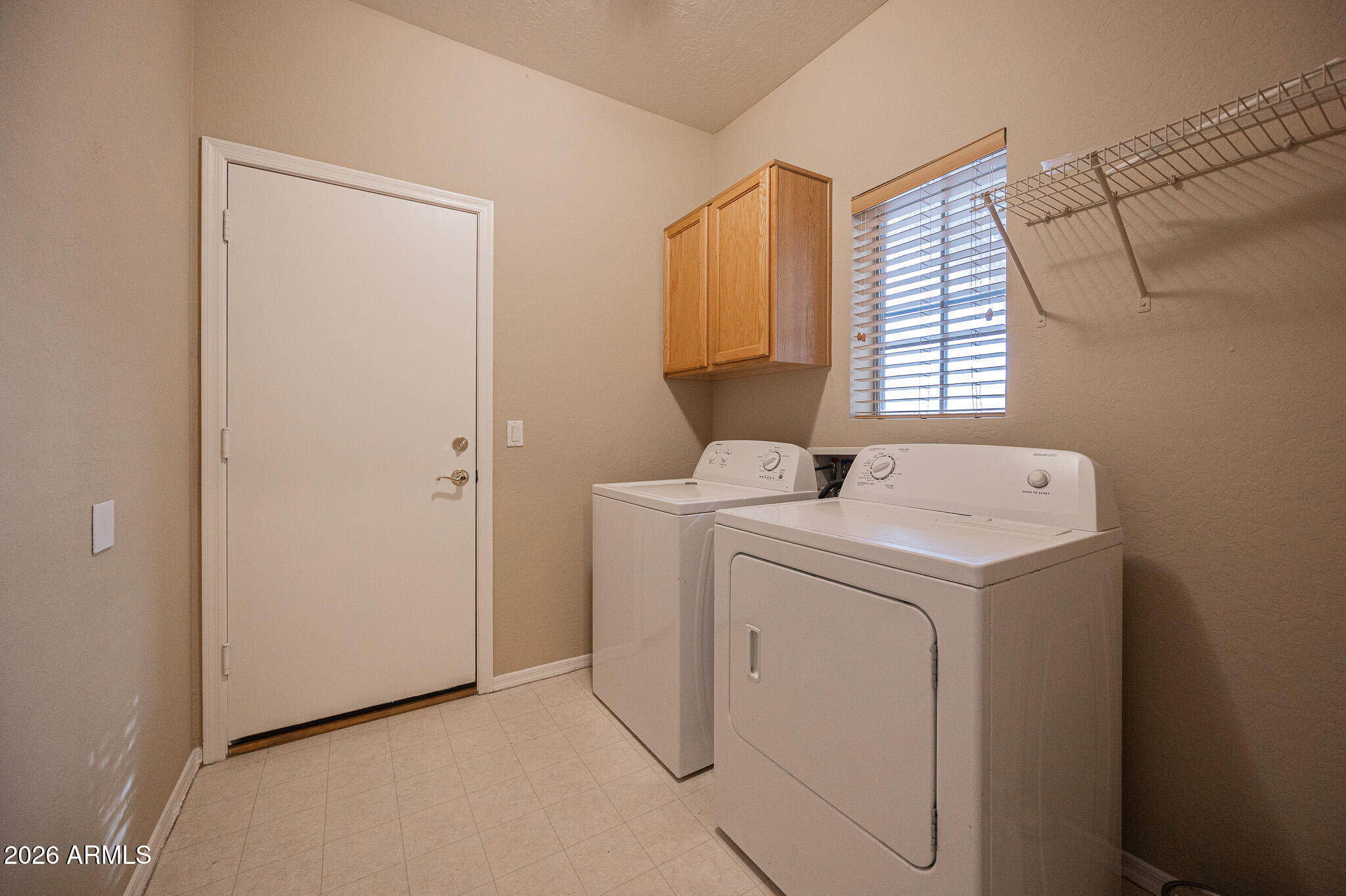 6426 South Nash Way Chandler, AZ 85249 - Photo 19 of 23 a utility room with dryer and washer