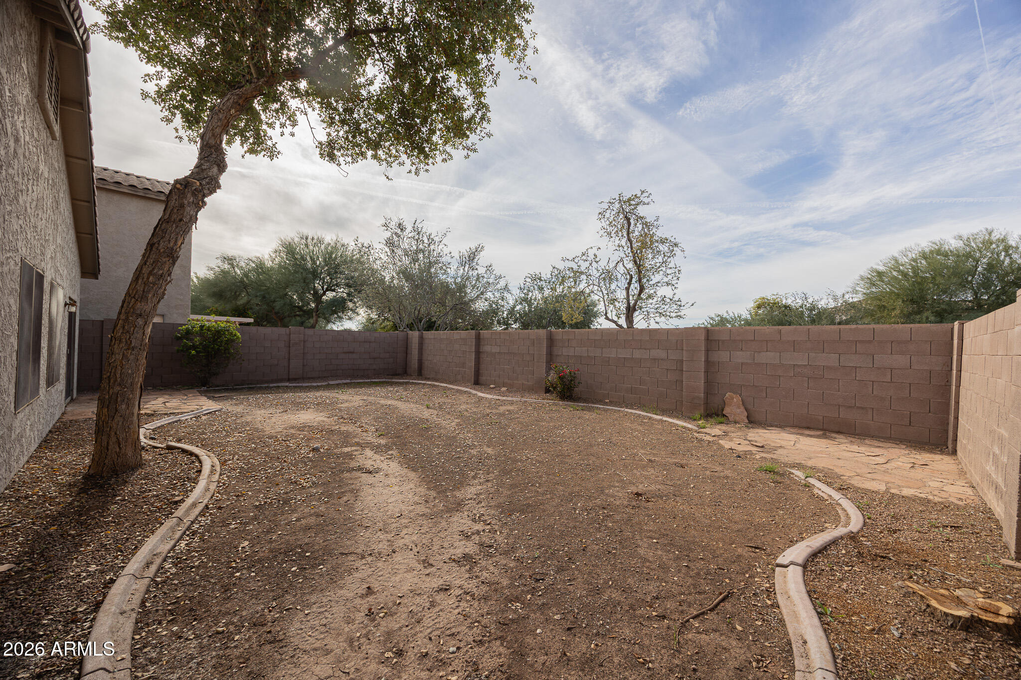 6426 South Nash Way Chandler, AZ 85249 - Photo 23 of 23 a backyard of a house with lots of green space