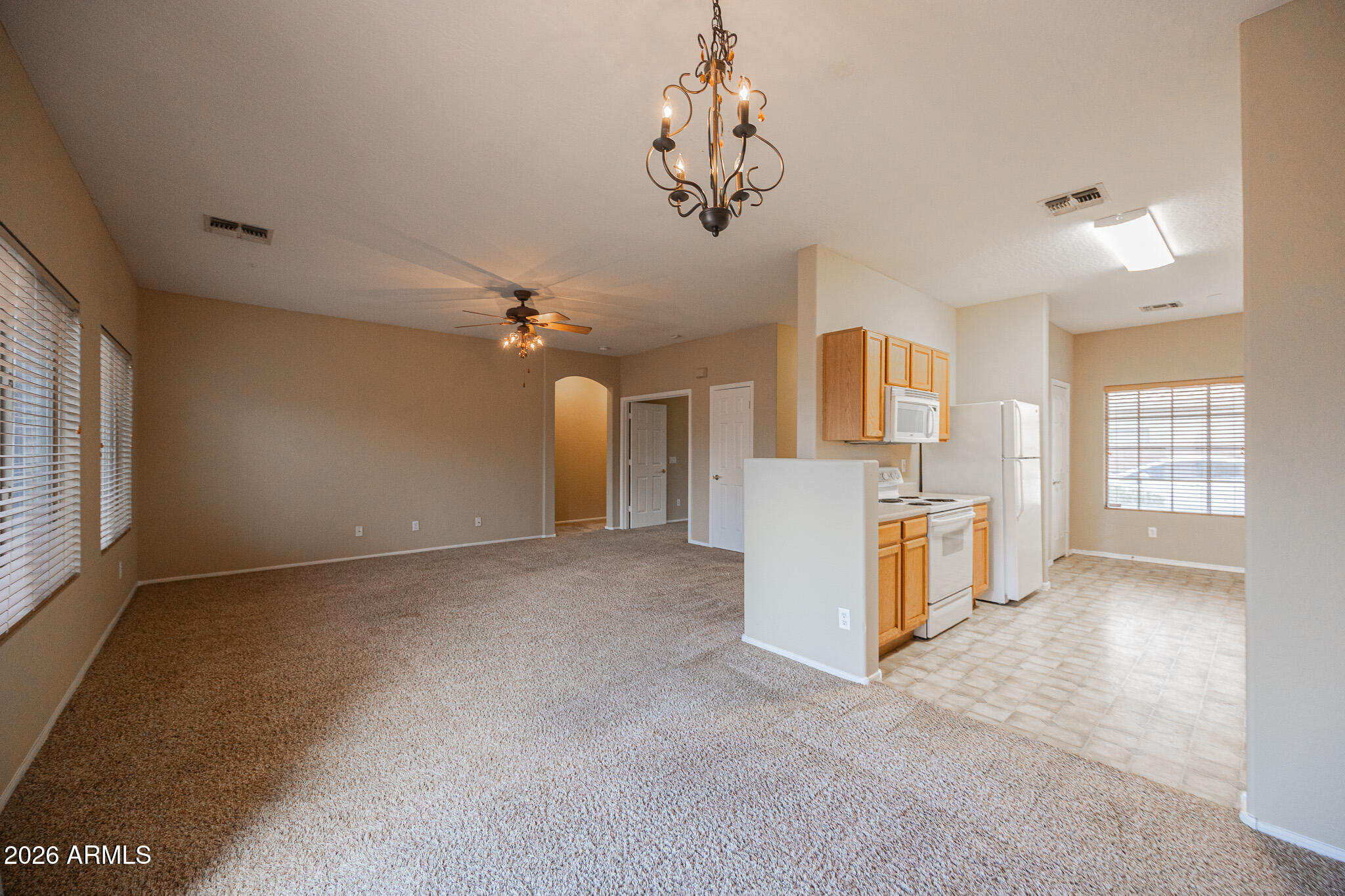 6426 South Nash Way Chandler, AZ 85249 - Photo 7 of 23 a view of a kitchen with a sink and cabinet area