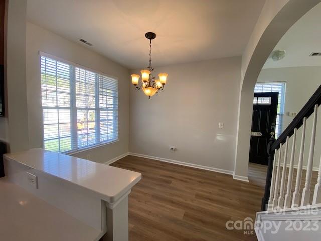 948 Copperstone Lane Fort Mill, SC 29708 - Photo 5 of 34 a view of an empty room with wooden floor and a window
