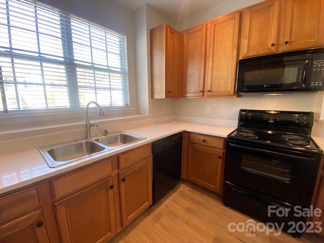 948 Copperstone Lane Fort Mill, SC 29708 - Photo 10 of 34 a kitchen with a sink stove and microwave