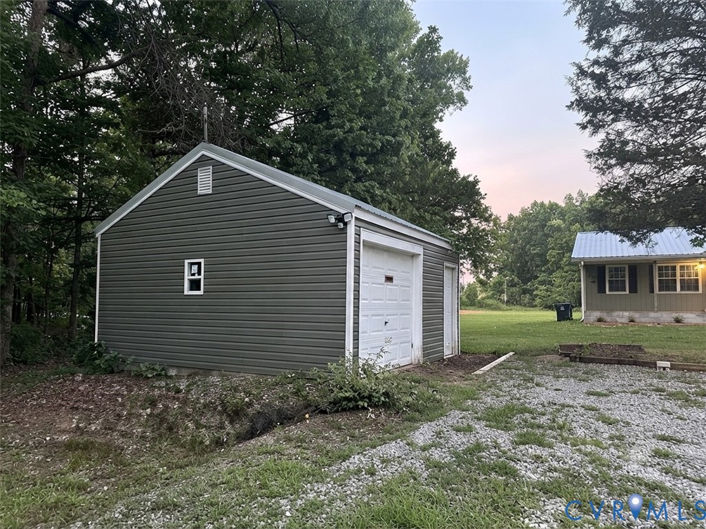 2338 George's Road Powhatan, VA 23139 - Photo 2 of 2 Detached garage featuring horizontal siding, a rol