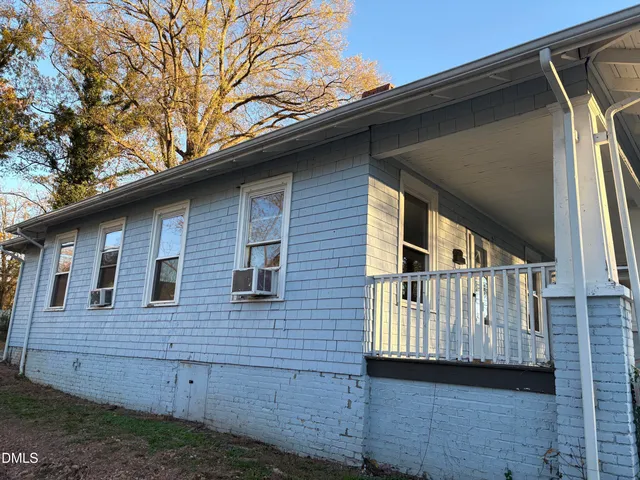 a view of a house with a roof deck