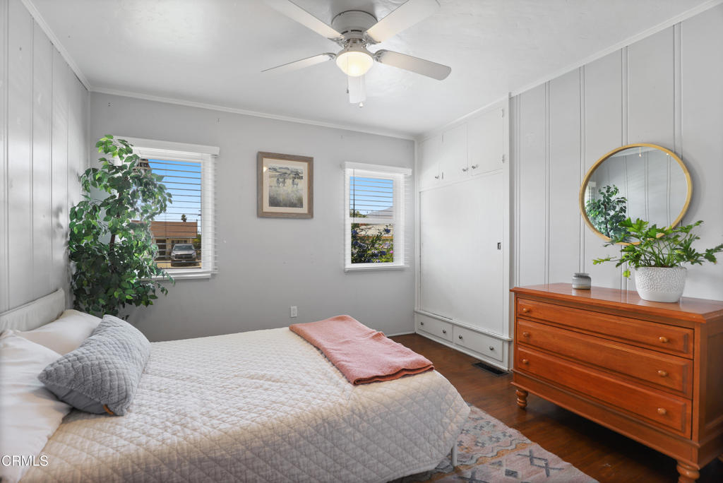 300 C Street Fillmore, CA 93015 - Photo 13 of 41 a bedroom with a bed and a potted plant
