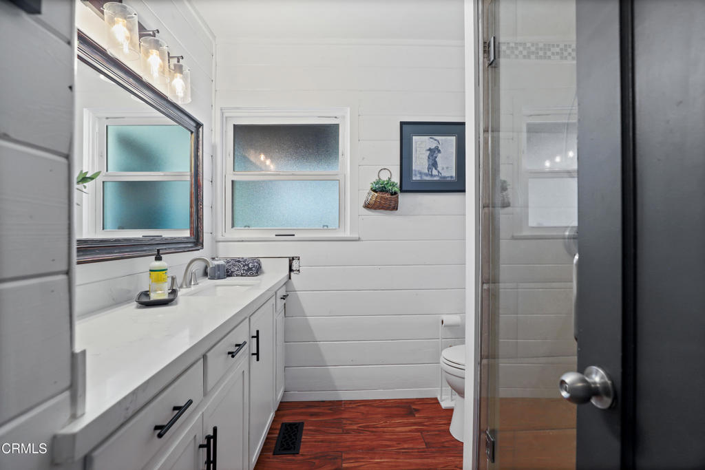 300 C Street Fillmore, CA 93015 - Photo 16 of 41 a bathroom with a sink and a mirror
