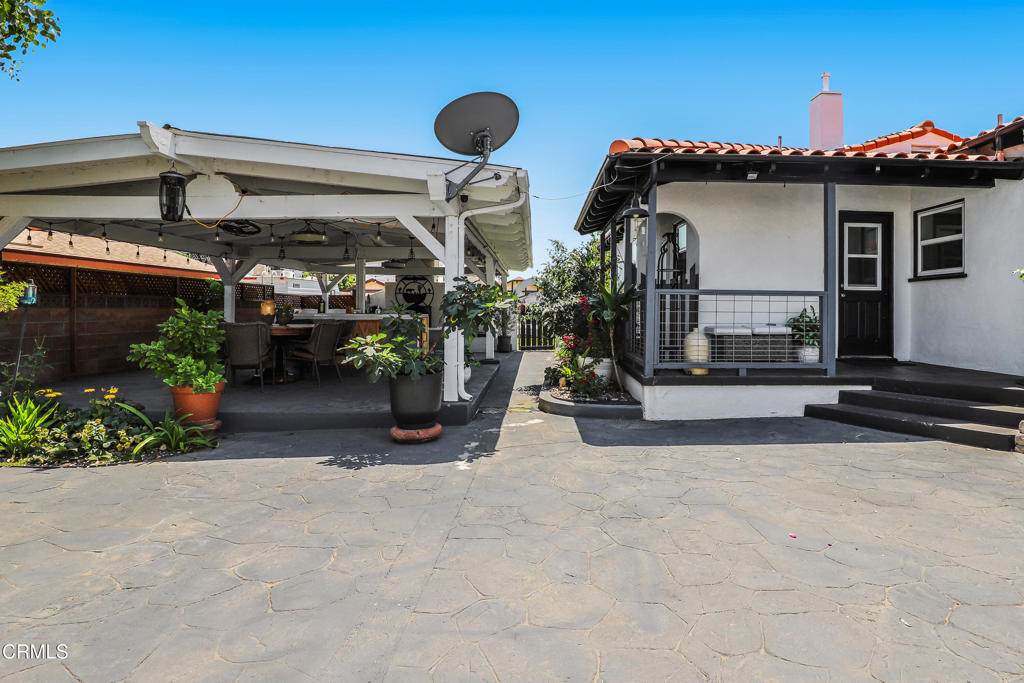 300 C Street Fillmore, CA 93015 - Photo 19 of 41 a view of the patio with table and chairs potted plants