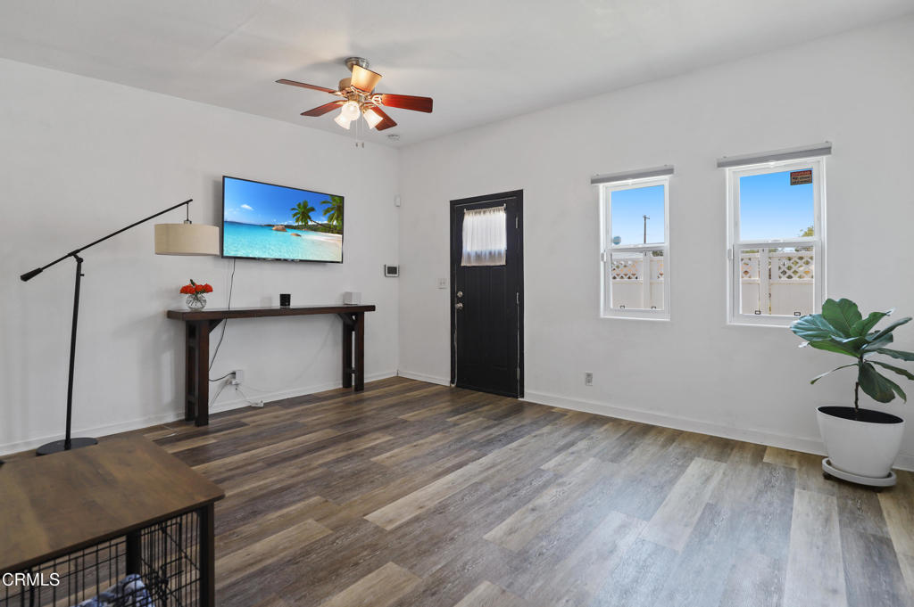 300 C Street Fillmore, CA 93015 - Photo 31 of 41 a view of an empty room with window and wooden floor