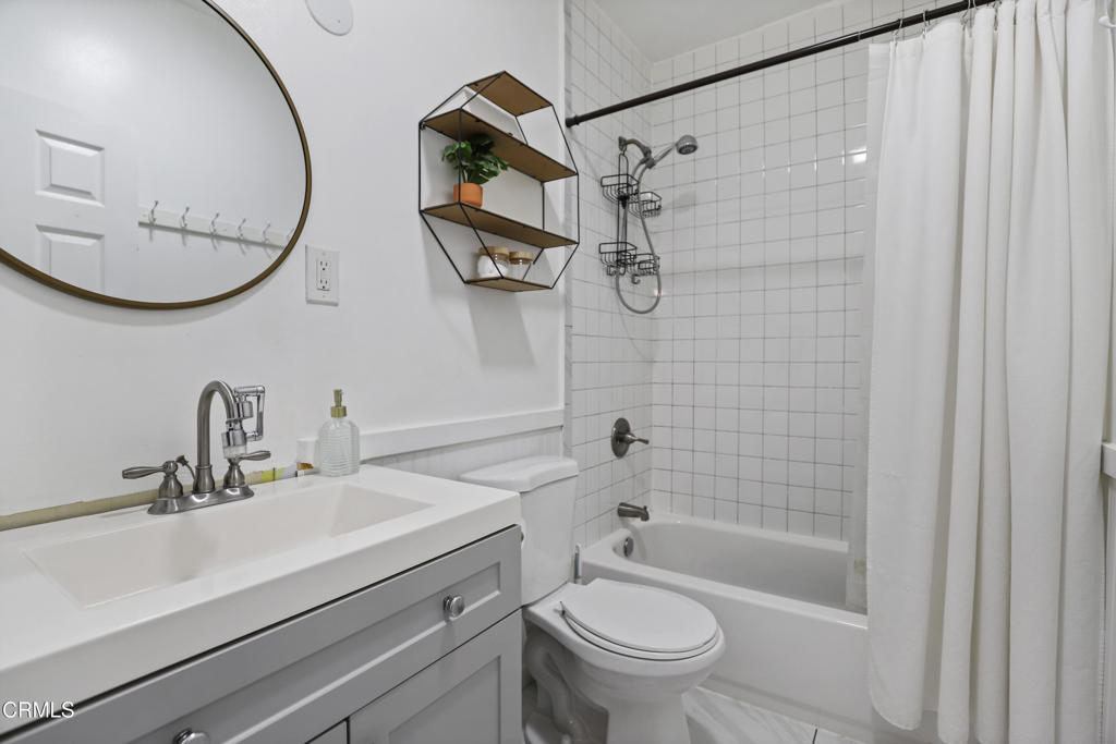 300 C Street Fillmore, CA 93015 - Photo 37 of 41 a bathroom with a sink a toilet and shower