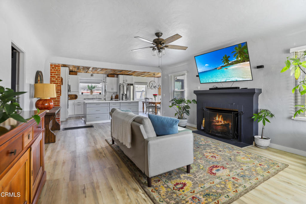 300 C Street Fillmore, CA 93015 - Photo 4 of 41 a living room with furniture and a fireplace