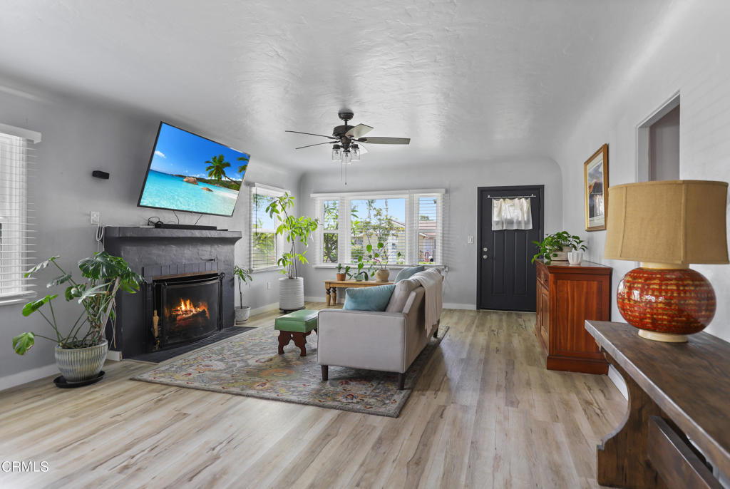 300 C Street Fillmore, CA 93015 - Photo 5 of 41 a living room with furniture and a fireplace