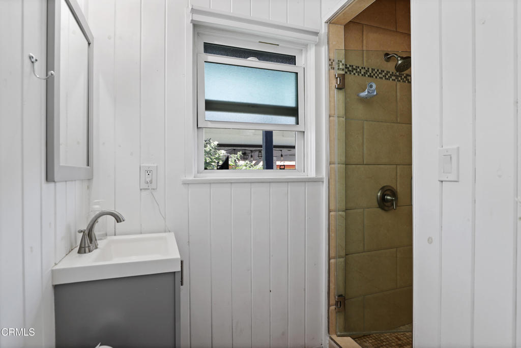 300 C Street Fillmore, CA 93015 - Photo 7 of 41 a bathroom with a sink and mirror