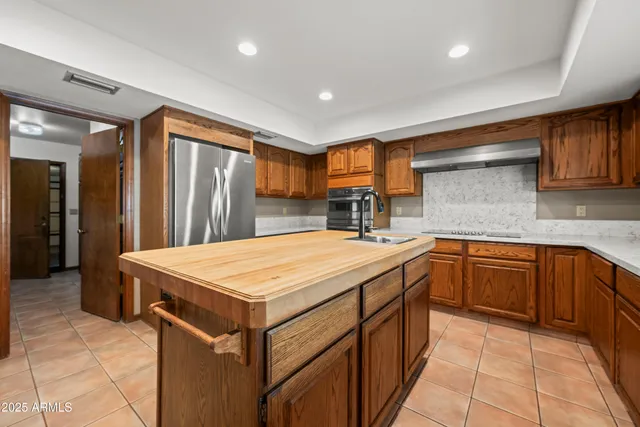 a view of an empty room and a window