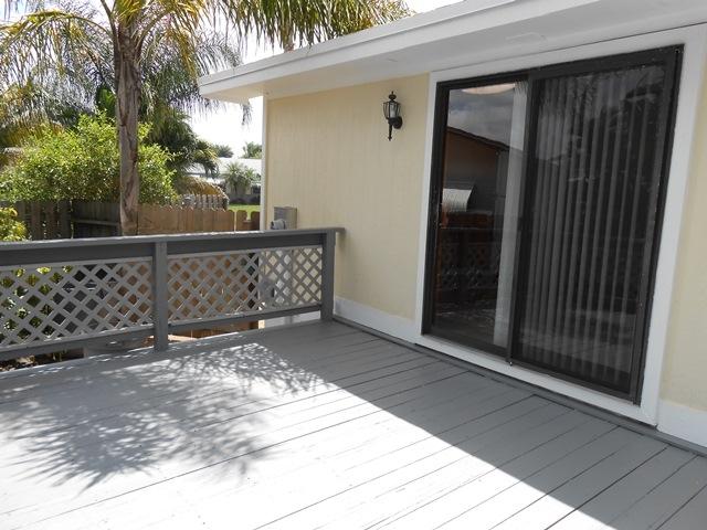 22829 Southwest 65th Way Boca Raton, FL 33428 - Photo 21 of 21 a view of wooden floor with a wooden fence