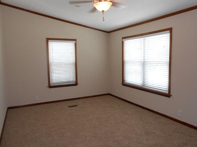 22829 Southwest 65th Way Boca Raton, FL 33428 - Photo 4 of 21 an empty room with a window