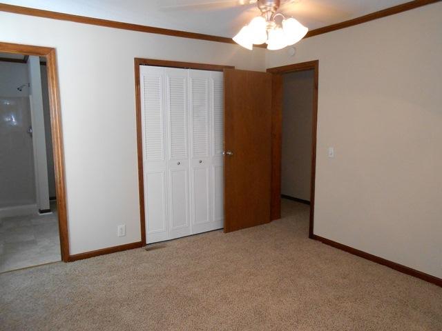 22829 Southwest 65th Way Boca Raton, FL 33428 - Photo 9 of 21 an empty room with a chandelier fan and a window