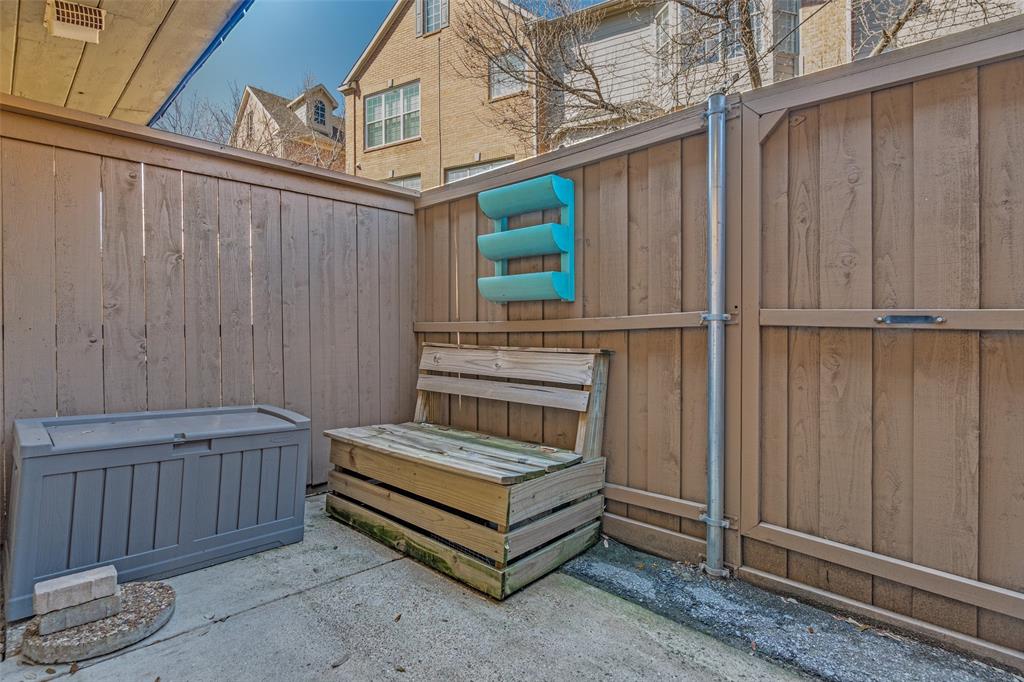 3623 Hawthorne Avenue Dallas, TX 75219 - Photo 15 of 28 Private rear patio with space for seating or storage and direct access to assigned parking.