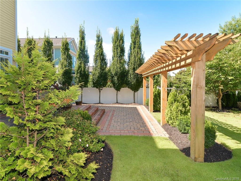 4317 Birkshire Heights Fort Mill, SC 29708 - Photo 23 of 23 a view of a garden with a fountain