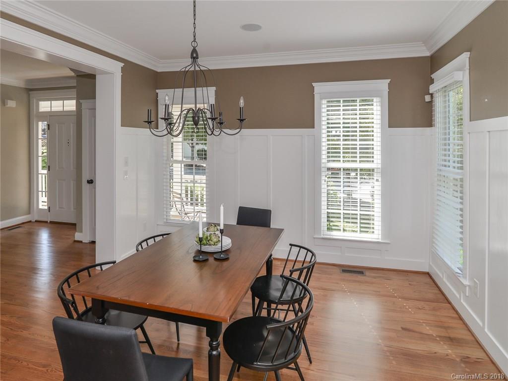 4317 Birkshire Heights Fort Mill, SC 29708 - Photo 4 of 23 a view of a dining room with furniture window and wooden floor