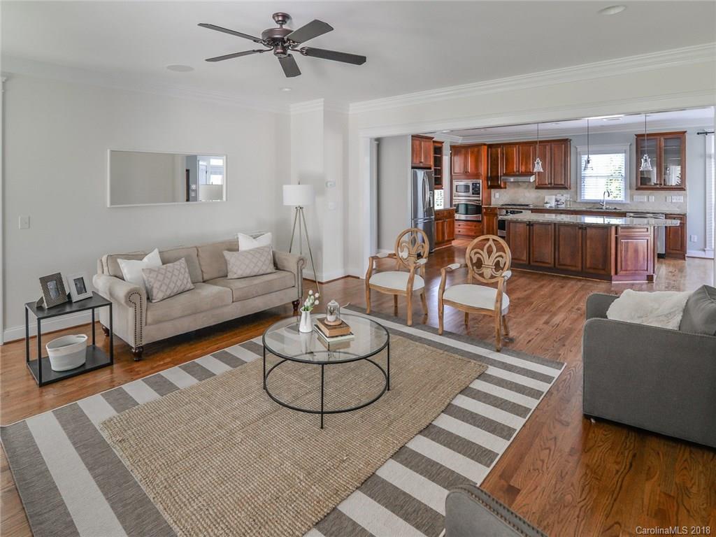 4317 Birkshire Heights Fort Mill, SC 29708 - Photo 9 of 23 a living room with furniture kitchen view and a table