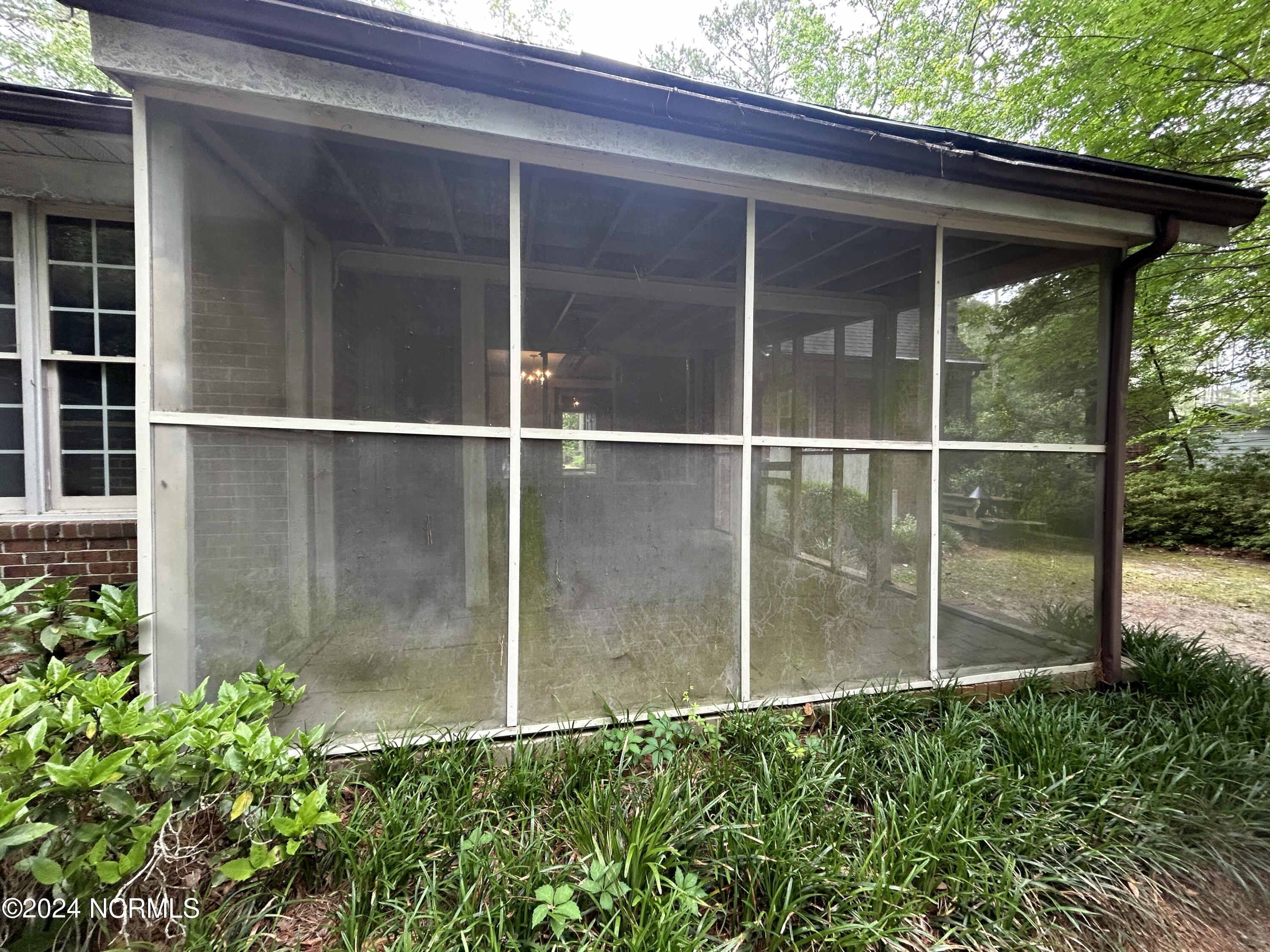1054 Oakview Road Williamston, NC 27892 - Photo 28 of 30 Screen porch
