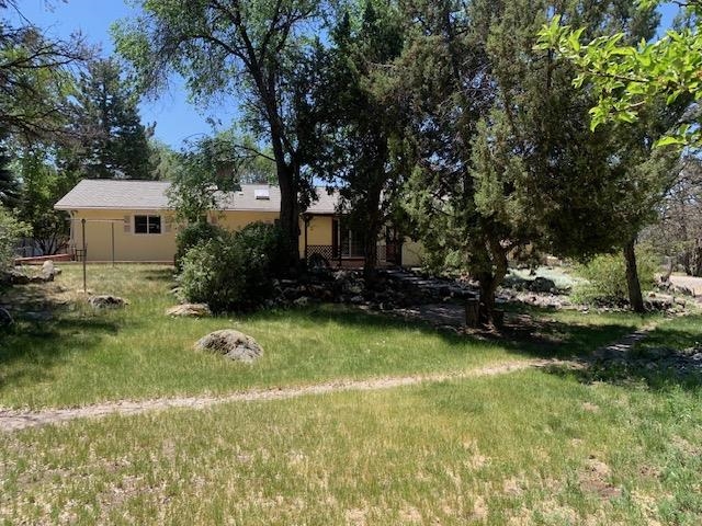 570 Southwest 2nd Court Cedaredge, CO 81413 - Photo 26 of 32 a view of a backyard with swimming pool