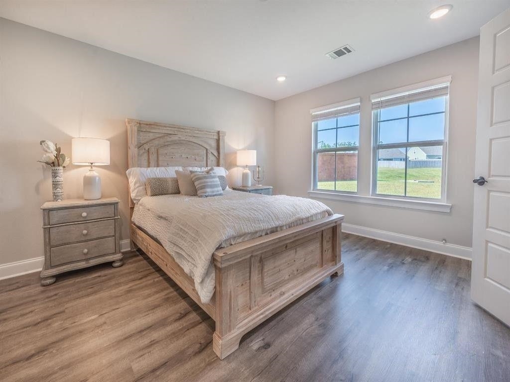 23906 Peppermint Street Elberta, AL 36530 - Photo 8 of 14 Bedroom with dark wood-style flooring and recessed lighting