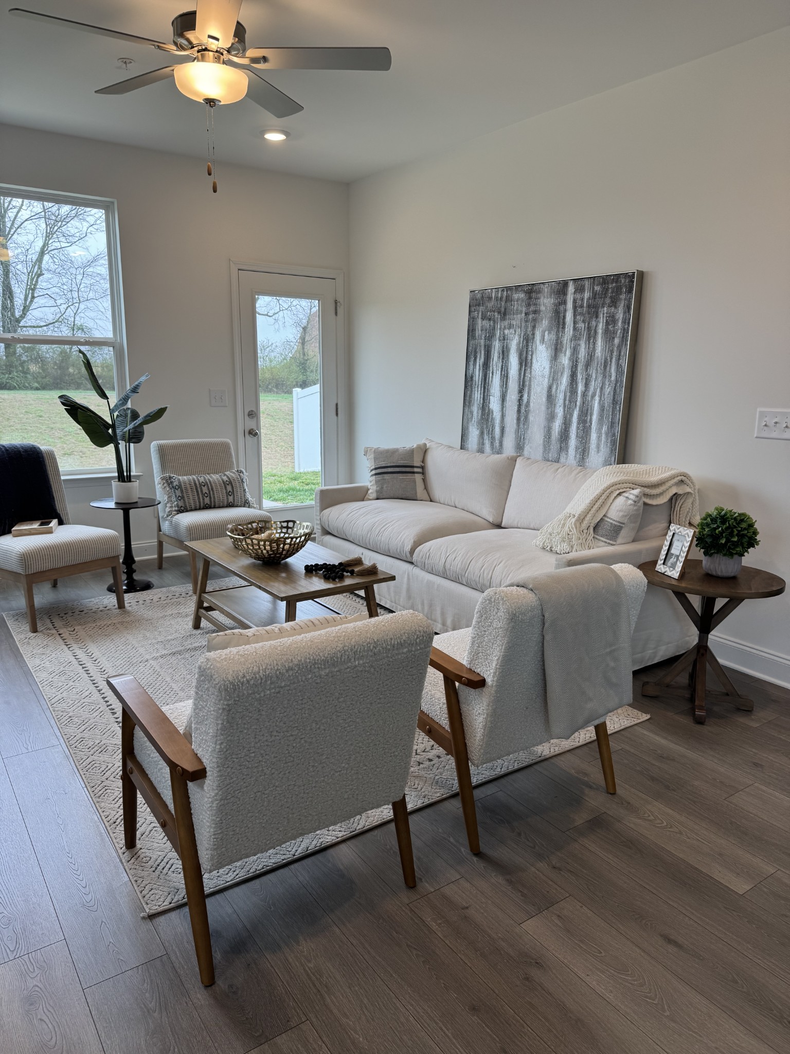 1166 June Wilde Ridge Spring Hill, TN 37174 - Photo 8 of 30 a living room with furniture and a chandelier