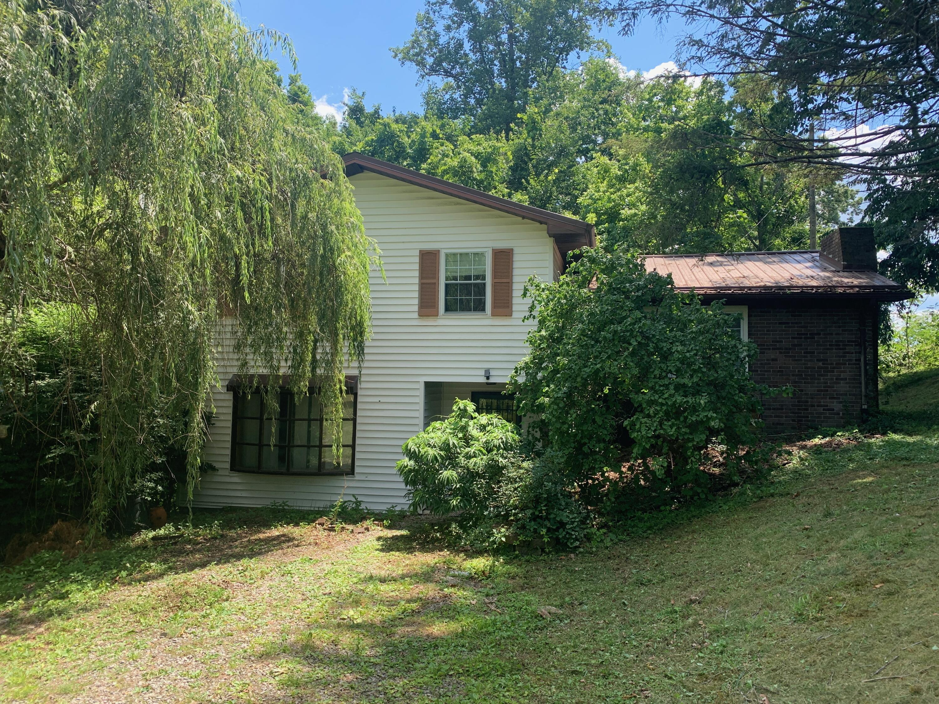 60 Grover Whitehead Road Whitley City, KY 42653 - Photo 1 of 13 IMG_3331