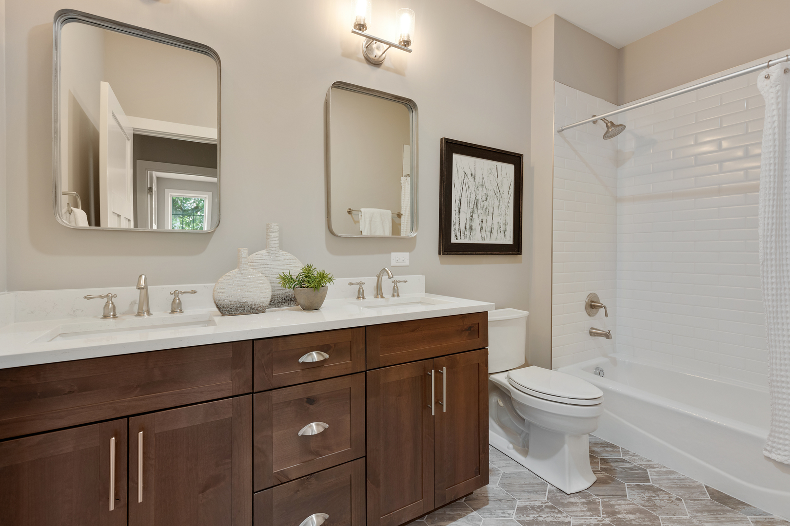 405 North 1st Street Geneva, IL 60134 - Photo 19 of 30 a bathroom with a toilet a sink a mirror a vanity and shower