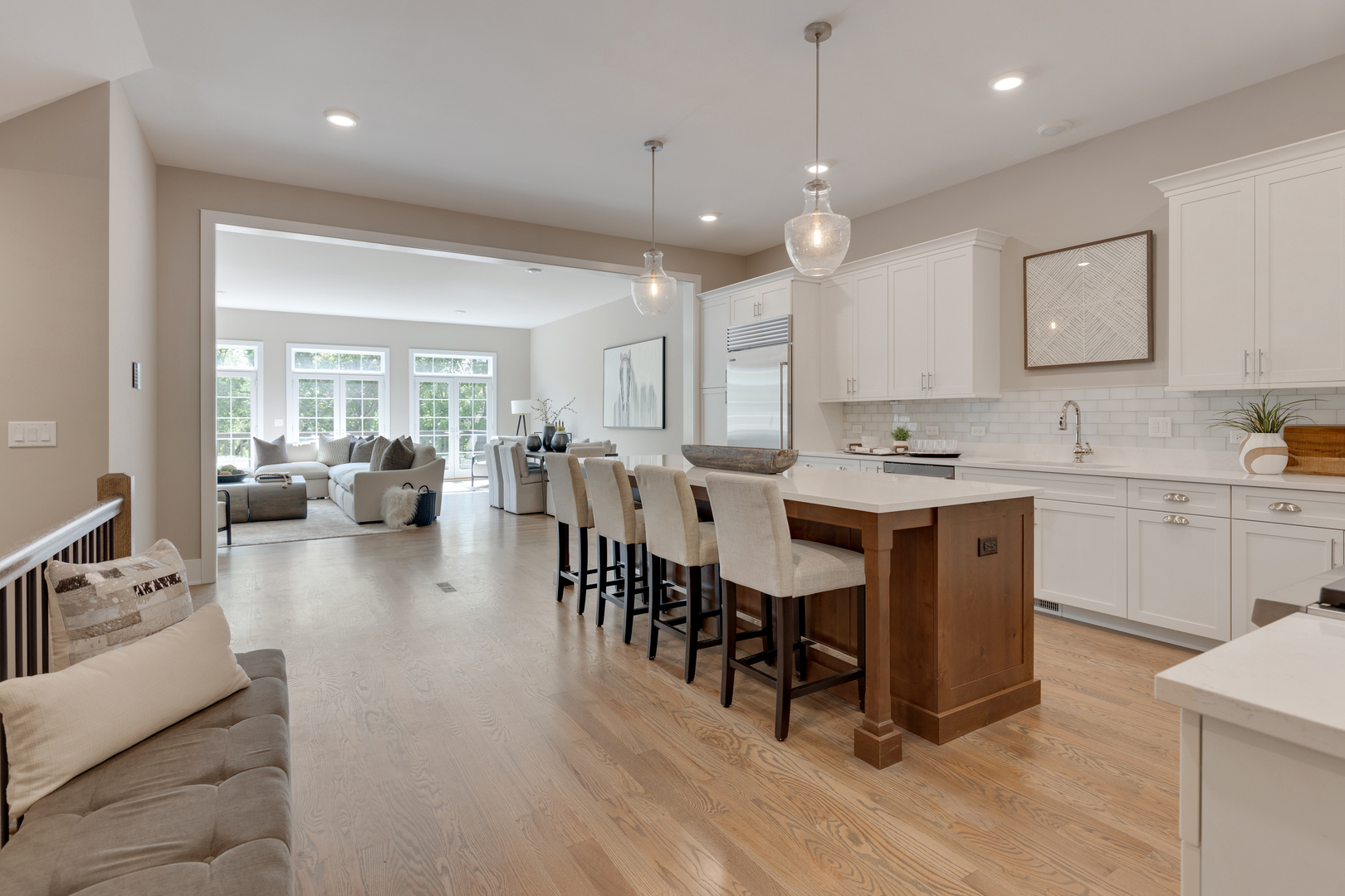 405 North 1st Street Geneva, IL 60134 - Photo 5 of 30 a large white kitchen with lots of counter space dining table and chairs