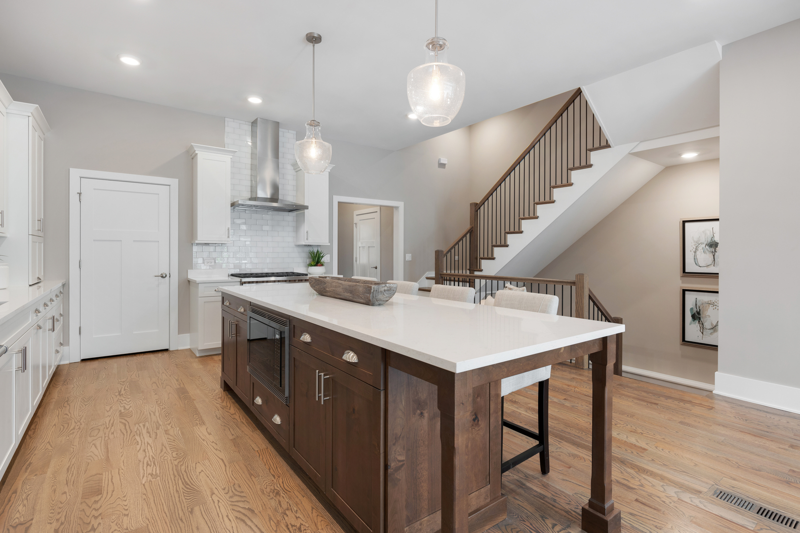 405 North 1st Street Geneva, IL 60134 - Photo 8 of 30 a kitchen with a sink a counter top space and stainless steel appliances
