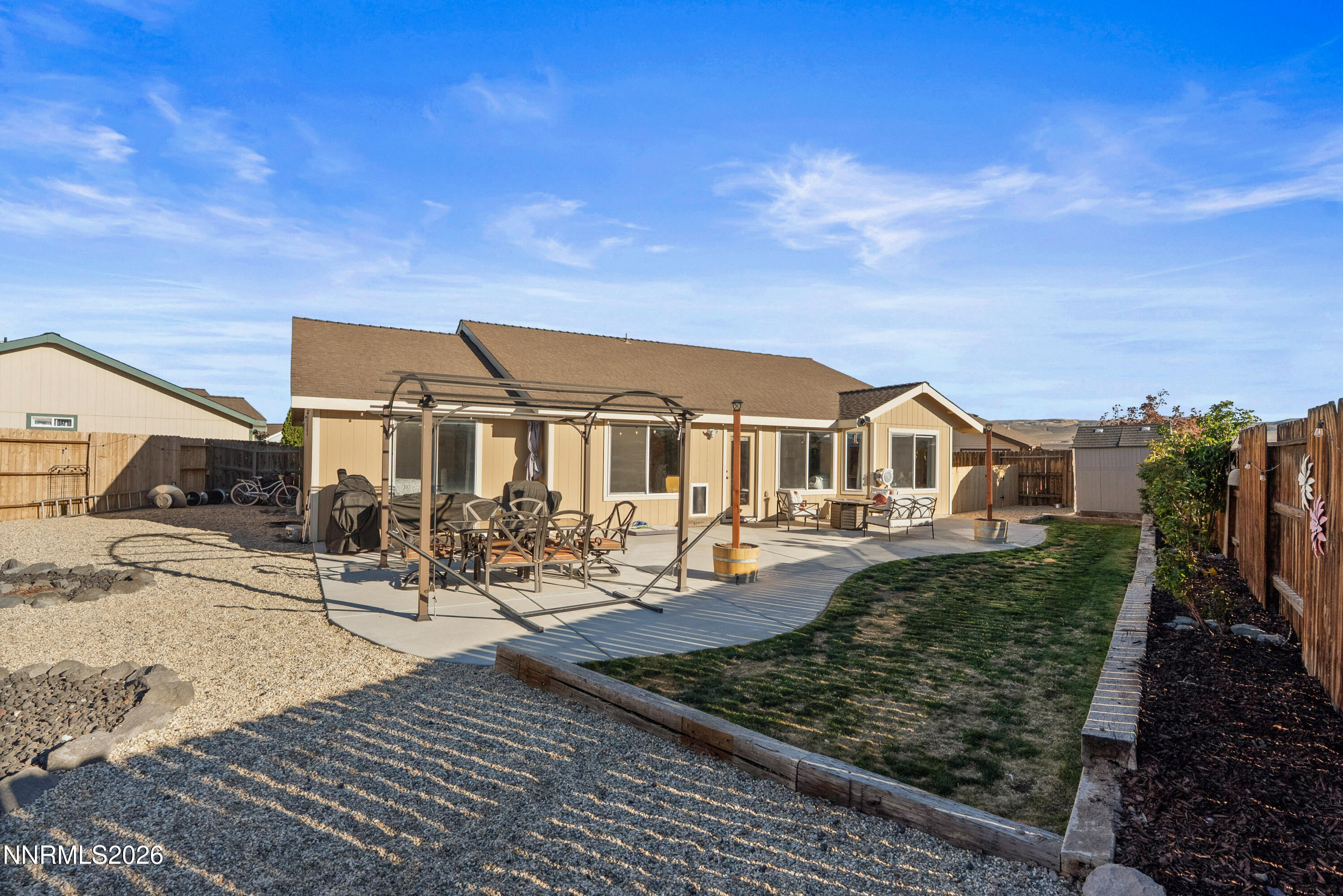 552 Spur Court Fernley, NV 89408 - Photo 43 of 46 a front view of a house with garden