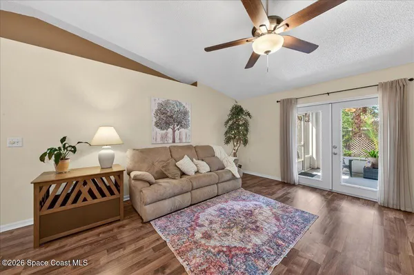 an aerial view of a house with outdoor space and lake view