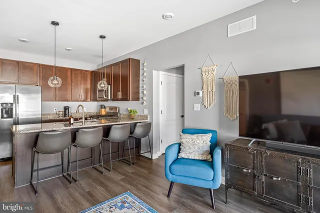 a bedroom with bed and a flat screen tv