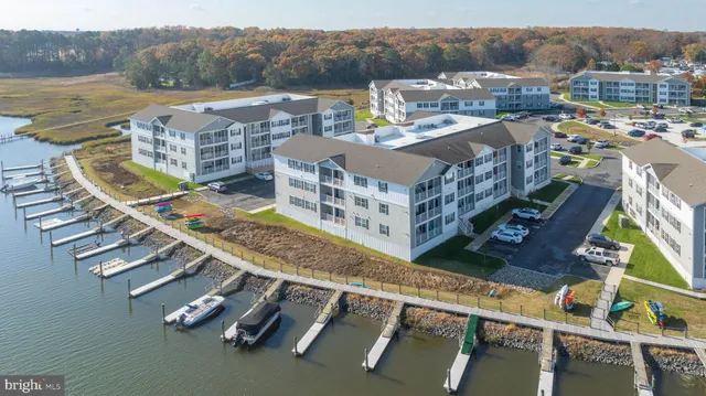 an aerial view of a house with a swimming pool