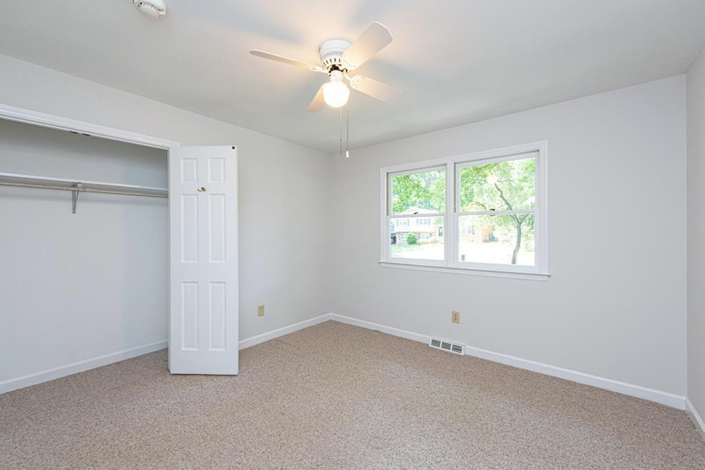 509 Compton Road Raleigh, NC 27609 - Photo 17 of 30 Bedroom 3 with ceiling fan and double window. Bedroom 3